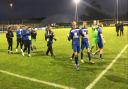 Chippenham players celebrate after their 1-0 win over Lincoln City.
