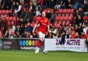 Wales World Cup squad member Jonny Williams in action for Swindon Town earlier this season Photo: Callum Knowles