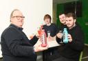 Swindon Advertiser reporters Aled Thomas, Daniel Angelini, Edward Burnett, and Jason Hughes with bottles and glasses of Prime.