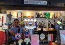 Sanjay Dogra inside The Harrow Inn pub in Wanborough, on the one year anniversary of being its landlord