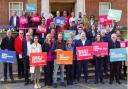 Labour candidates and supporters in the 2023 Swindon election. Coun Jim Robbins in in the front row in a blue suit