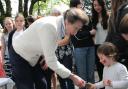 Princess Anne handed gifts to children during a visit to Swindon on the coronation weekend