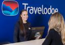 Stock image of a Travelodge employee