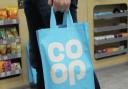 A Co-op shopper allegedly injured a member of staff and left with stolen goods