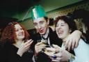 Revellers Claire Litchfield, Giles Woodford and Claire Gilbert at a New Year’s party at The Goddard Arms in 1995