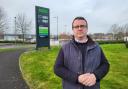 Cllr Daniel Adams is protesting Asda's move to cashless fuel stations in Swindon.