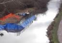 An emergency dam has been put up to stop a sinkhole potentially emptying the Wichelstowe canal