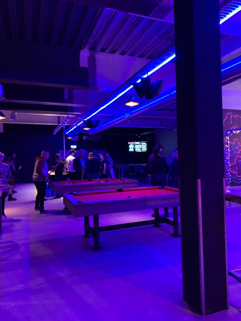Guests enjoy the new bar, restaurant and games