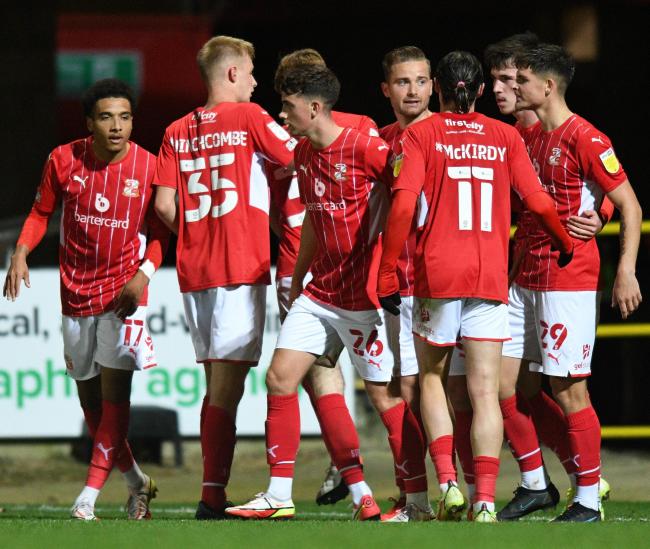 The Town players celebrate Jordan Lyden’s goal against Newport County in the EFL Trophy on Tuesday night                  Photo: Rob Noyes
