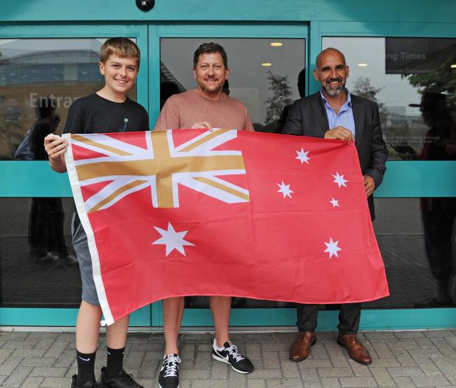 Clem Morfuni with an STFC-coloured Australian flag          Photo: Rob Noyes