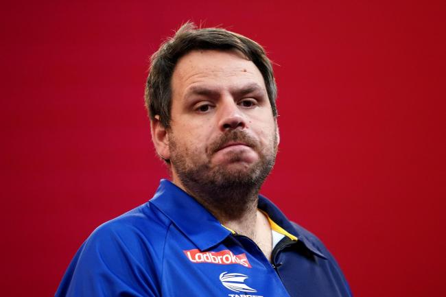 Adrian Lewis (pictured) was beaten 6-5 by Peter Wright on Saturday (Zac Goodwin/PA).