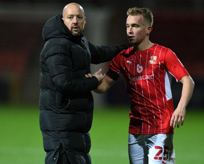 Swindon Town head coach Ben Garner says the club will be looking to add more players like Louis Reed (right) to the squad in January 			  Photo: Rob Noyes