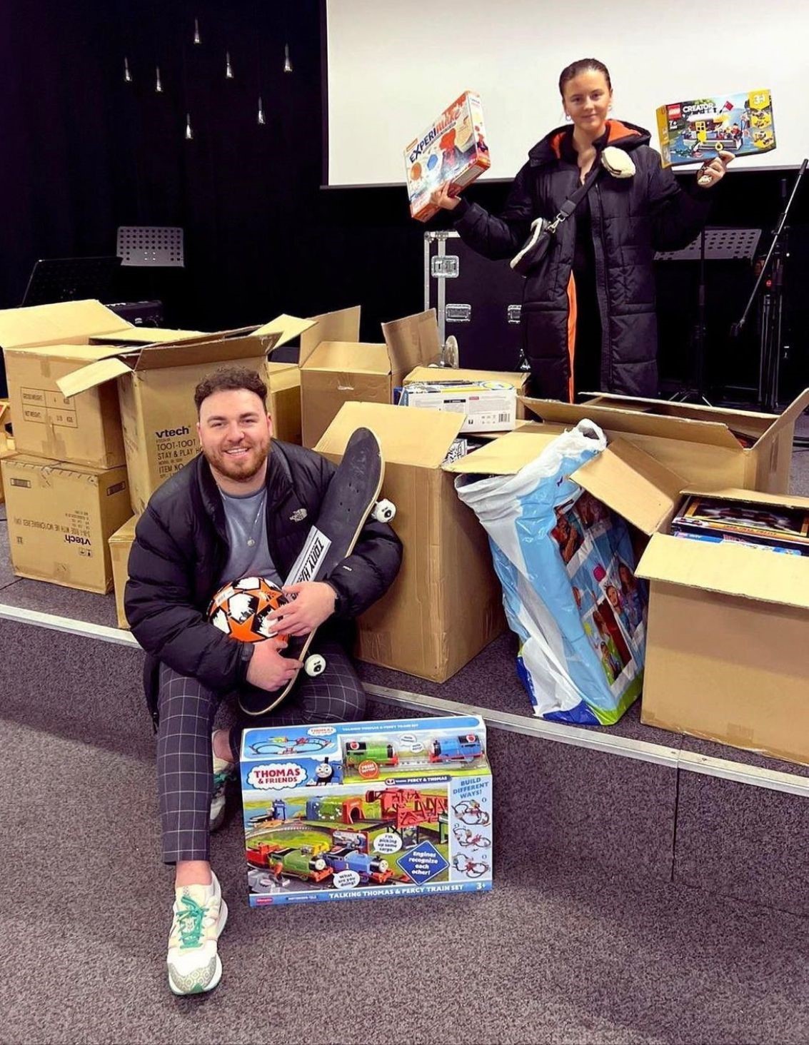 Reece Chaplin and his fiancée Stephanie Childs with the donated gifts for their Christmas appeal