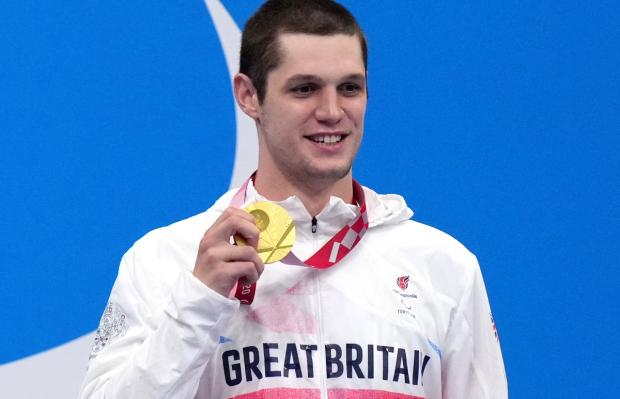 Swindon Advertiser: Reece Dunn has been made an MBE for services to swimming. Picture: PA