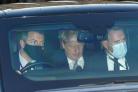 Prime Minister Boris Johnson (centre) leaves the Houses of Parliament in Westminster, London, as public anger continues following the leak on Monday of an email from the Prime Minister's principal private secretary Martin Reynolds inviting 100