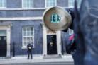 The door of the Prime Minister's official residence in Downing Street, Westminster, London, is seen through the viewfinder of a television camera as public anger continues following the leak on Monday of an email from Boris Johnson's principal