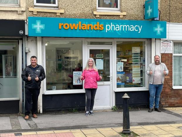 Swindon Advertiser: Labour councillors outside the pharmacy after NHS England rules it could not be merged with Park Lane