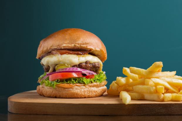 Swindon Advertiser: Burger and chips. Credit: Canva