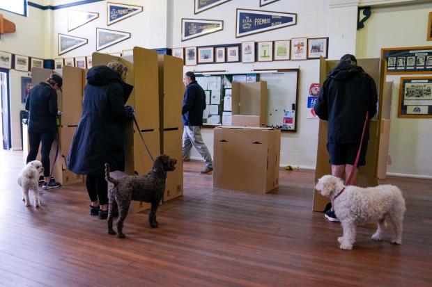 Citizens cast their votes at a polling booth in Sydney, Australia
