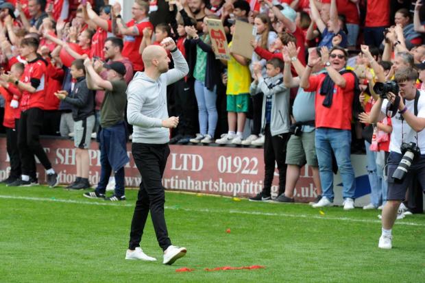 Ben Garner salutes Swindon Town fans at Walsall on the last day of the regular season. Picture: ROB NOYES