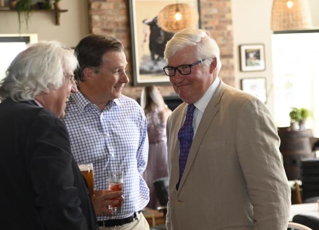 Swindon Advertiser: James Arkell mingles at the grand opening of his brewery's newest pub