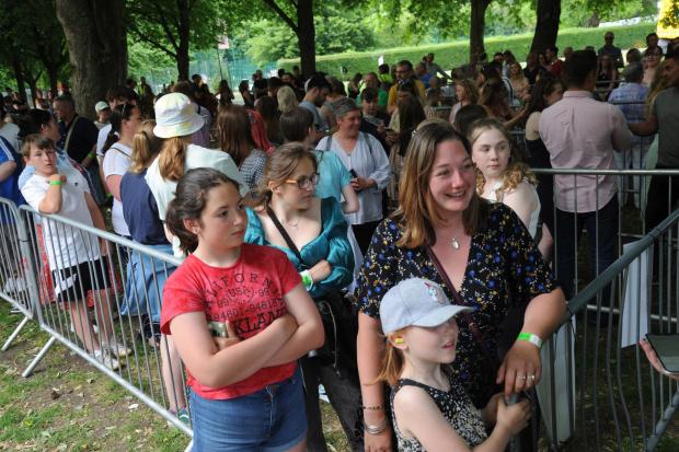 Swindon Advertiser: First in the queue for the George Ezra Concert Sarah Harris with Emily aged 11 and Charlotte aged 8 who arrived at 2.30 pm. Photo: Trevor Porter