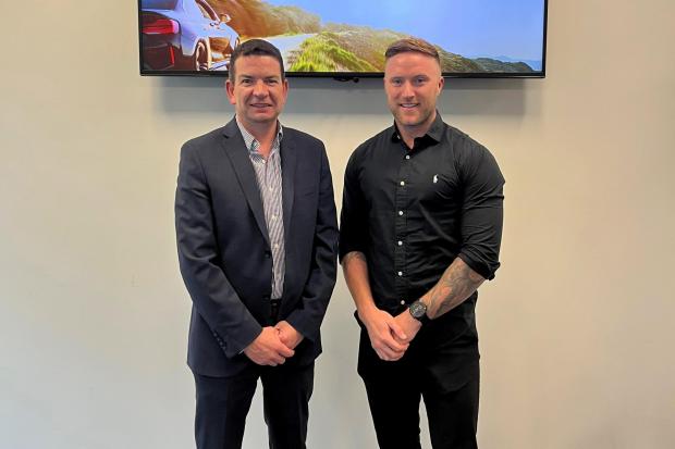(Left) James O’Malley - Select Car Leasing director - and former Swindon Town winger Alan O’Brien who now works as a broker at SCL