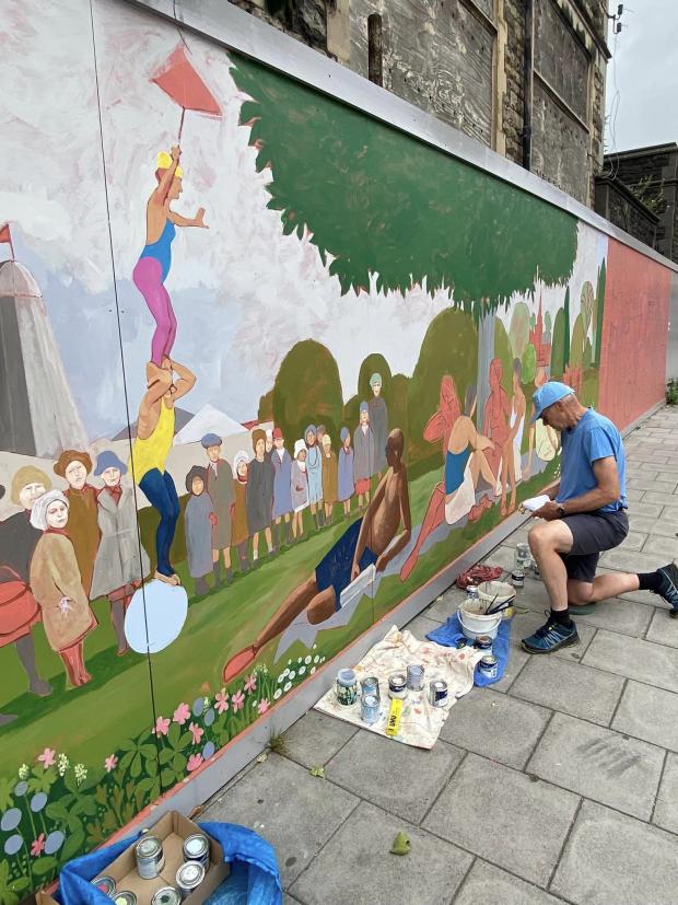 Swindon Advertiser: The 'Health and Wellbeing' mural takes shape. Picture: CARYN KOH