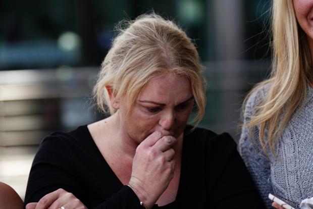 Swindon Advertiser: Archie's mother Hollie Dance surrounded by family and friends, outside the Royal London hospital in Whitechapel, east London, speaking to media following the death of her 12 year old son Archie Battersbee. (Aaron Chown/PA wire/PA images)