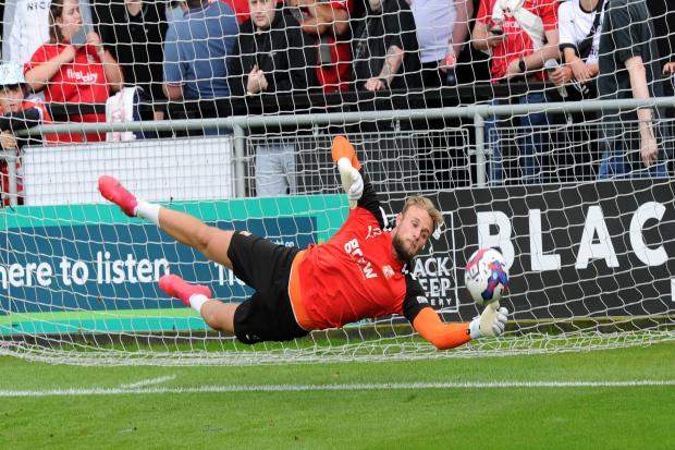 Swindon Town goalkeeper Lewis Ward is set for his first start since the League Two play-off semi-final second leg                    Photo: Rob Noyes