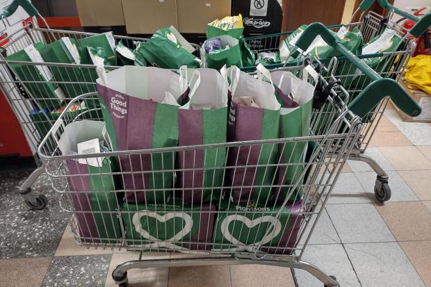 Some of the food parcels being donated by Morrisons in Westbury to help alleviate holiday hunger this summer. Photo; Morrisons