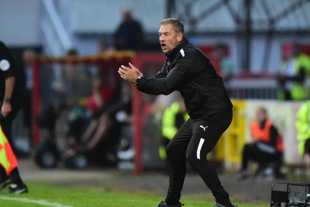 Swindon Town head coach Scott Lindsey cajoles his players during their 1-1 draw with Leyton Orient on Tuesday   Photo: Alex James