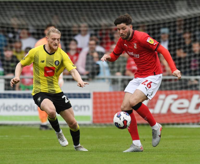 Ex-Swindon Town defender Cian Harries joins National League club