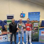 Neil Smith with the OSC Grand Final winner’s trophy together with former world champion Greg Harlow (left) and runner-up James Rippey