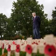 RAF veteran Mike Smith observes the planted tributes during the official opening of the 2021 Royal British Legion Field of Remembrance at the National Memorial Arboretum in Alrewas, Staffordshire. Credit: PA
