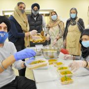 People at the Sikh Gurdwara in Gorse Hill are putting together meals for the vaccination centre volunteers.
Pic - Gurinder Singh -  left, organiser
Date 6/1/2022
Pic by Dave Cox