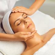 A woman having a face massage. Credit: Canva