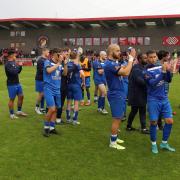 Chippenham applaud the travelling support after their 1-0 loss at Ebbsfleet in the play-off semi-final 	             Photo: Richard Chappell