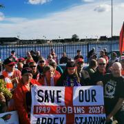 Robins fans gather to demand answers on lack of Abbey Stadium building work