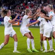 England players celebrate Fran Kirby's goal against Sweden, which made it 4-0 on Tuesday night. Picture: PA