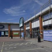 An empty unit at Greenbridge Retail Park will become a Cancer Research superstore
