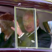 King Charles III and the Queen Consort leaving Clarence House