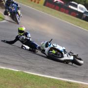 Charlie Nesbitt slides across the track at Snetterton after a fall in round eight of the National Superstock Championship     Photo: Bonnie Lane