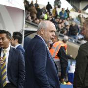 Anindya Bakrie (left), Horst Geicke (centre) and Oxford United boss Karl Robinson. Picture: David Fleming