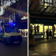 Emergency services at the Survivor shop in Swindon town centre where a woman collapsed and died