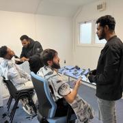 The Harbour Project offers free haircuts as one of its many services that help refugees.