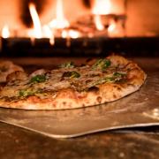 Here are five of the best pizza places in your area according to their Tripadvisor reviews. (Canva)