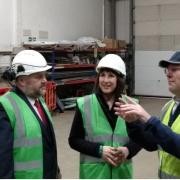 Councillor Jim Robbins,  and shadow Chancellor Rachel Reeves MP listen to Andy Cornell CEO of ABSL