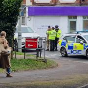A ''suspected grenade' saw police head to a quiet road near Waitrose on Monday