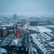 Swindon town centre covered in white
